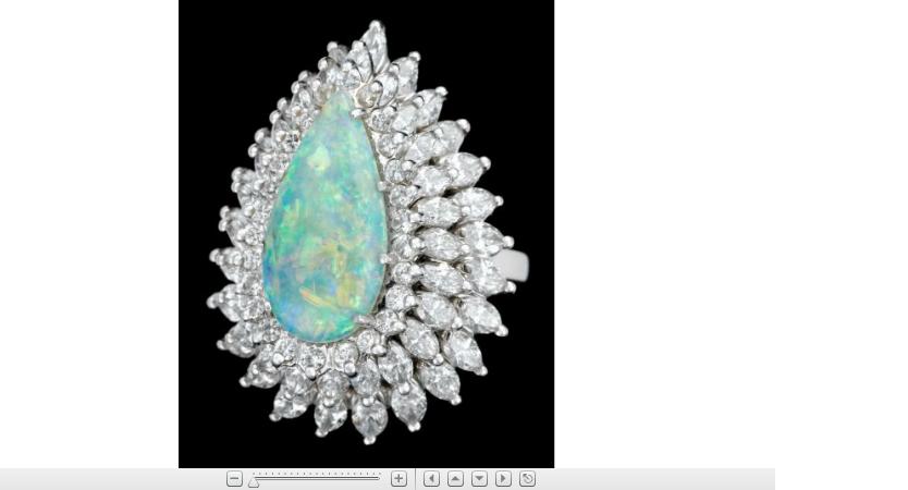 Appraisal: Platinum and diamond opal cluster ringPear shape white opal with