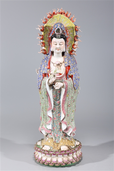 Appraisal: Elaborate Chinese famille rose enameled porcelain three-sided deity with flaming