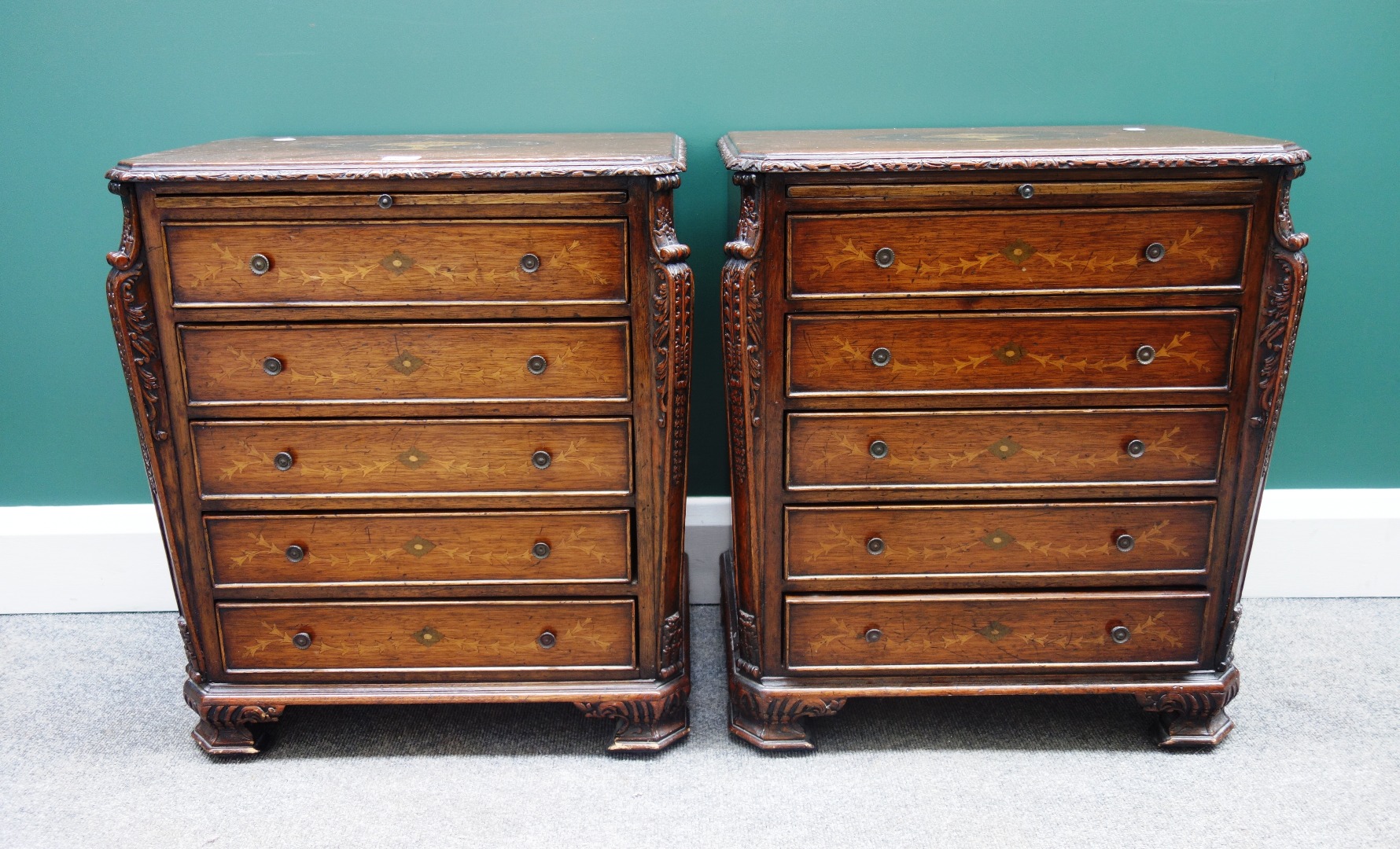 Appraisal: A pair of marquetry inlaid mahogany diminutive chests of th