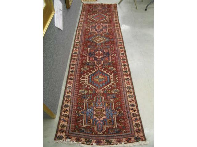 Appraisal: Heriz Persian Handmade Runner geometric medallions red field ' x