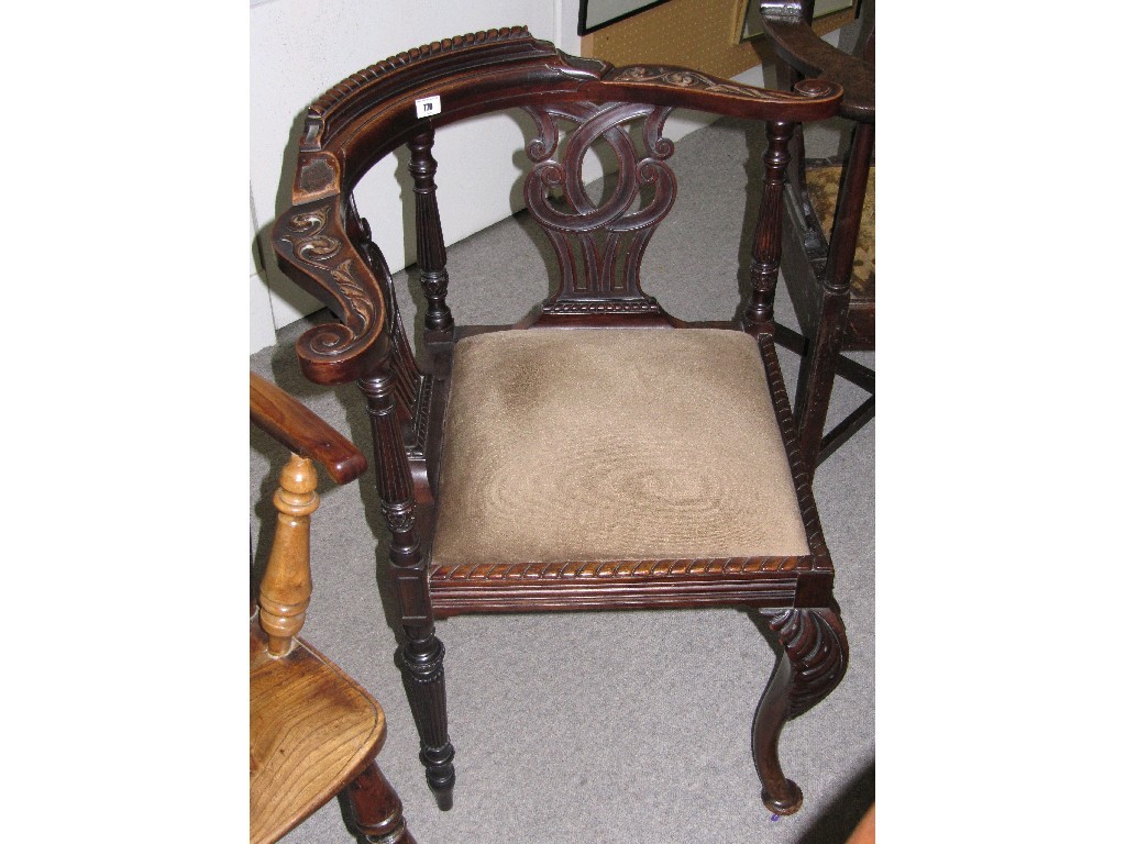 Appraisal: Carved mahogany corner chair