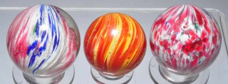 Appraisal: Lot of Onionskin Marbles Description Largest is a four panel