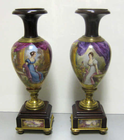 Appraisal: PAIR OF FRENCH PORCELAIN URNS Each body painted with classical