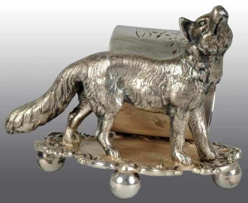 Appraisal: Large Wolf Napkin Holder Description Marked Barbour Silver Co Wolf