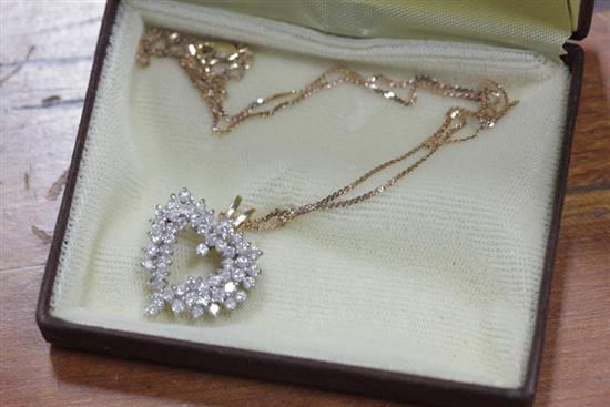 Appraisal: DIAMOND PENDANT In the form of a heart having approximately