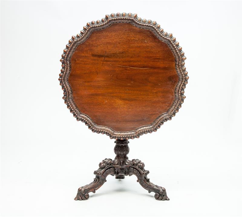 Appraisal: George III Style Carved Mahogany Tilt-Top Tripod Table x in