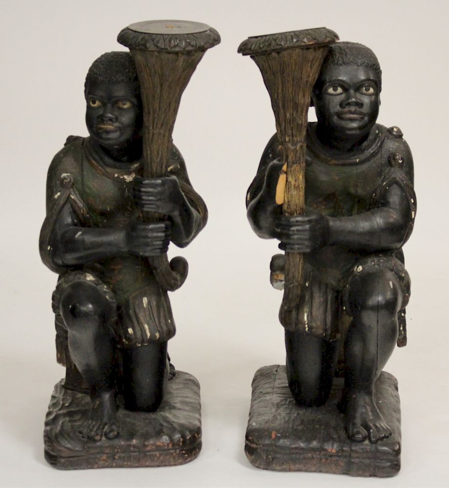 Appraisal: Kneeling Carved Wood Blackamoor Figures th C Paint decorated and