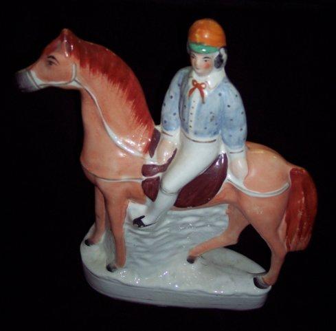 Appraisal: A Staffordshire figure of a jockey up possibly Fred Archer