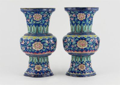 Appraisal: A pair of Chinese Canton enamel famille rose vases painted