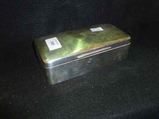 Appraisal: A SILVER CIGARETTE BOX of plain rectangular form Chester