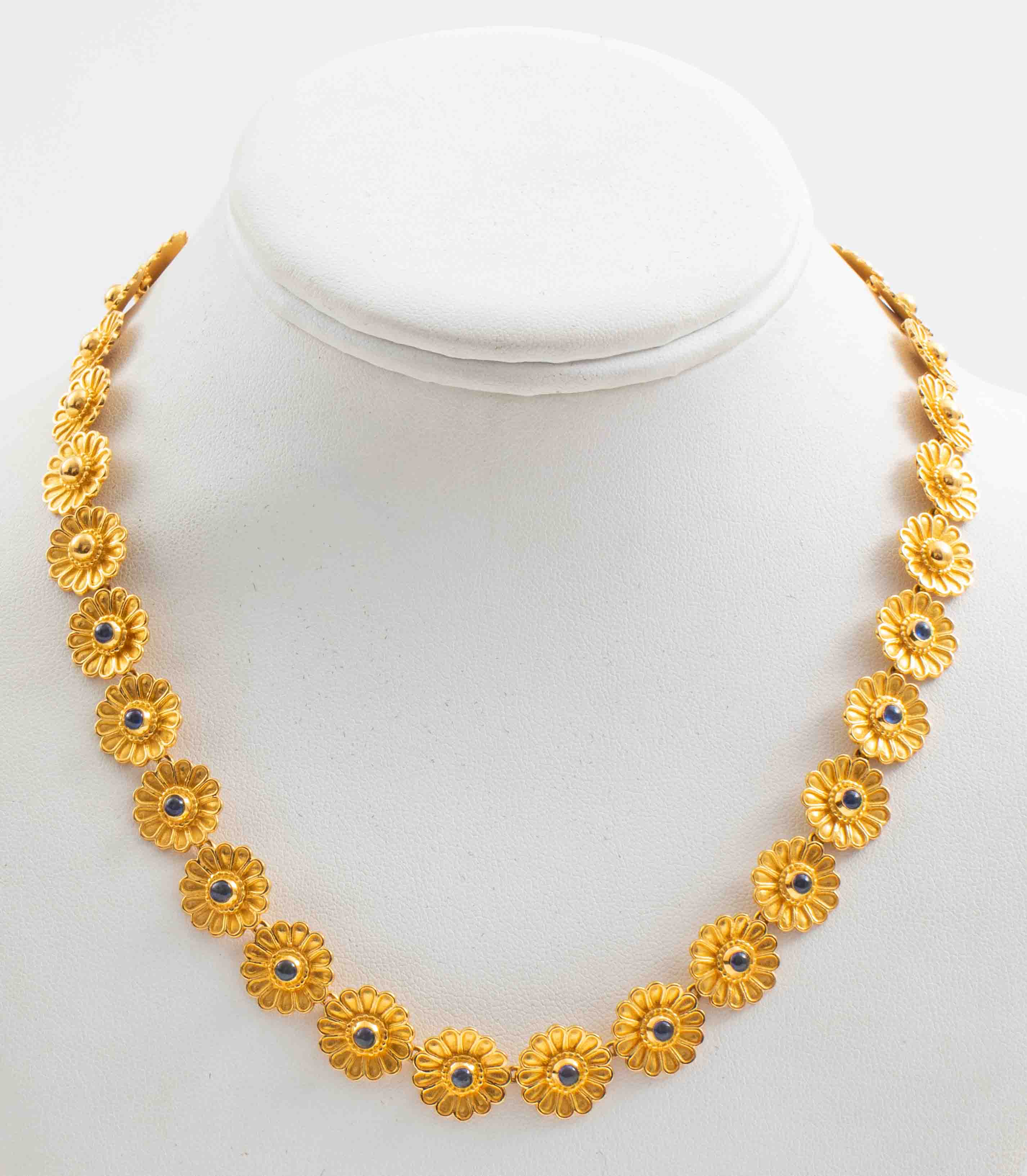 Appraisal: MMA K YELLOW GOLD SAPPHIRE FLOWER NECKLACE The Metropolitan Museum