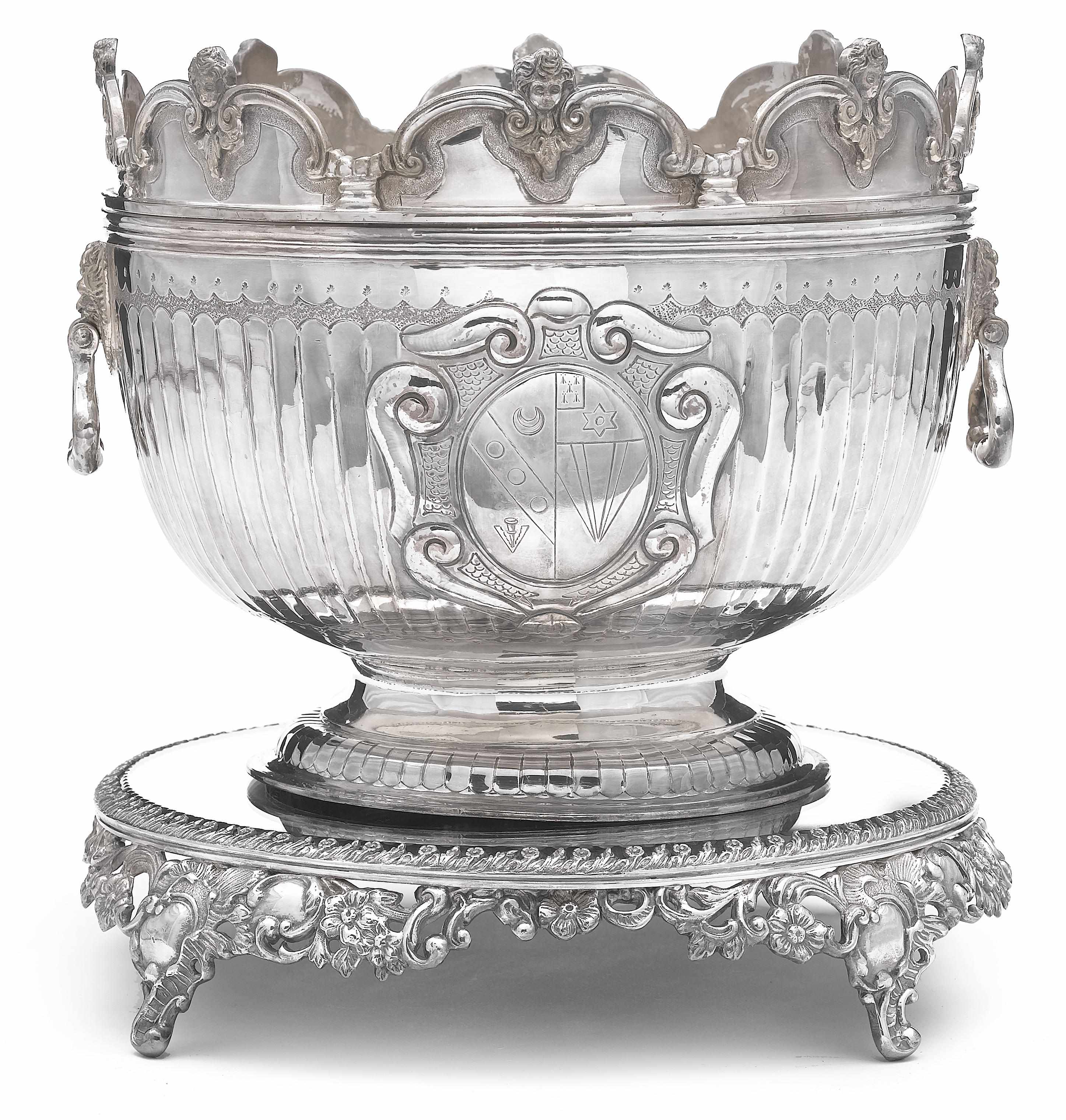 Appraisal: A plated Monteith bowl and a mirrored plateau height of