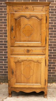 Appraisal: A th Century French provincial walnut bonnetiere the central drawer