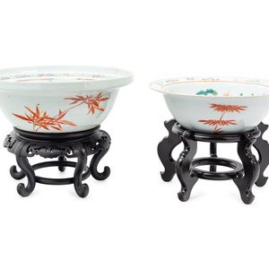 Appraisal: Two Chinese Enameled Porcelain Bowls with Wood Stands th Century