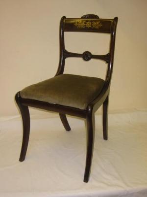 Appraisal: A COMPOSITE SET OF SIX REGENCY MAHOGANY CHAIRS with brass