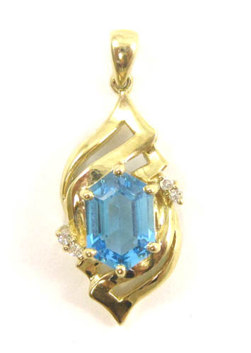 Appraisal: BLUE TOPAZ DIAMOND AND YELLOW GOLD PENDANT The k gold