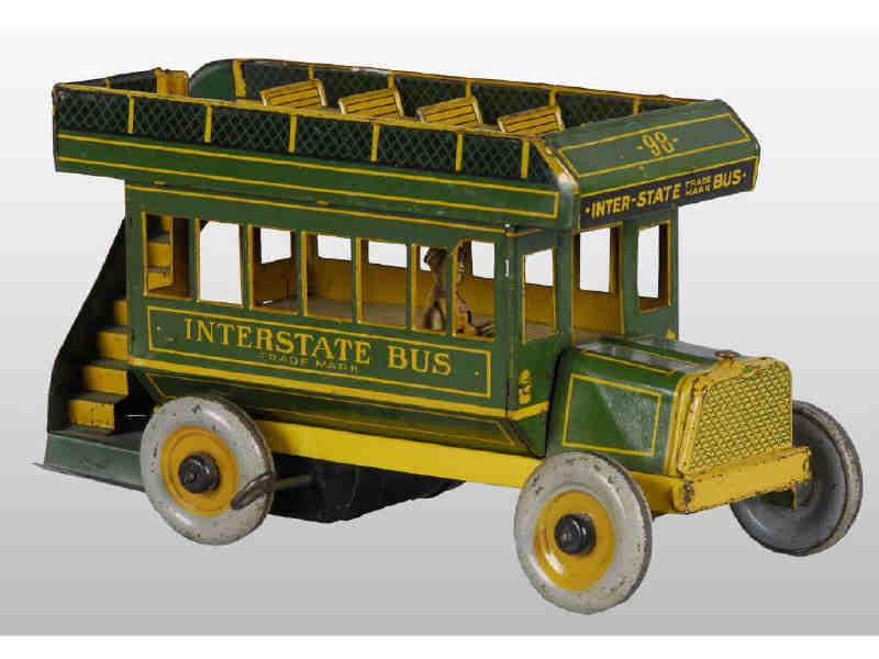 Appraisal: Strauss Tin Wind-Up Interstate Bus Toy Description Working Includes original