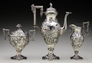 Appraisal: OUTSTANDING THREE PIECE STERLING SCENIC DECORATED TEA SET BY S