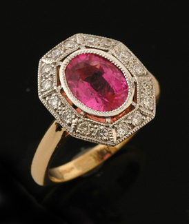 Appraisal: A tourmaline and diamond plaque ring The octagonal cluster centrally