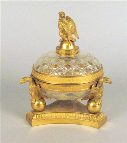 Appraisal: Continental gilt-bronze and cut-glass box th century Of flattened circular