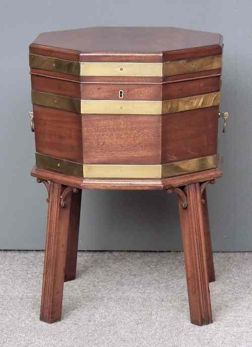 Appraisal: A modern Titchmarsh Goodwin mahogany and brass bound octagonal wine