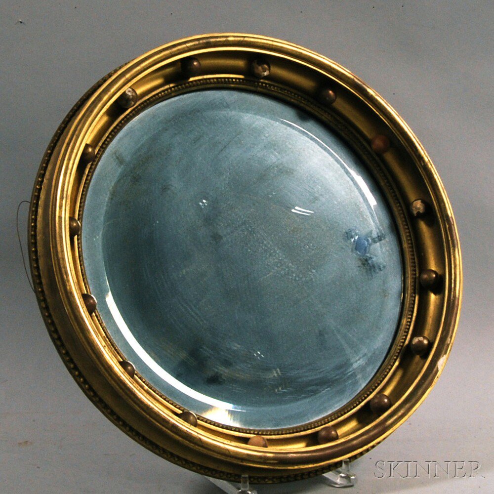 Appraisal: Classical-style Gilt-gesso Mirror with beveled glass mirror dia in Estimate