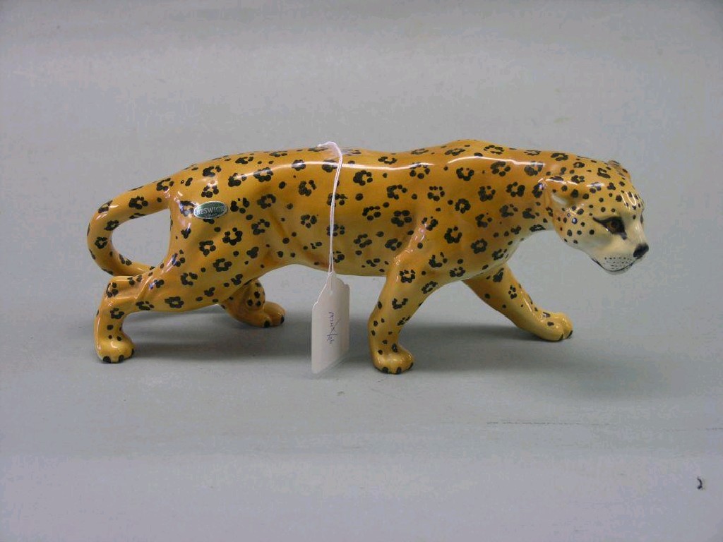 Appraisal: A Beswick Leopard model designed by Gredington golden brown with