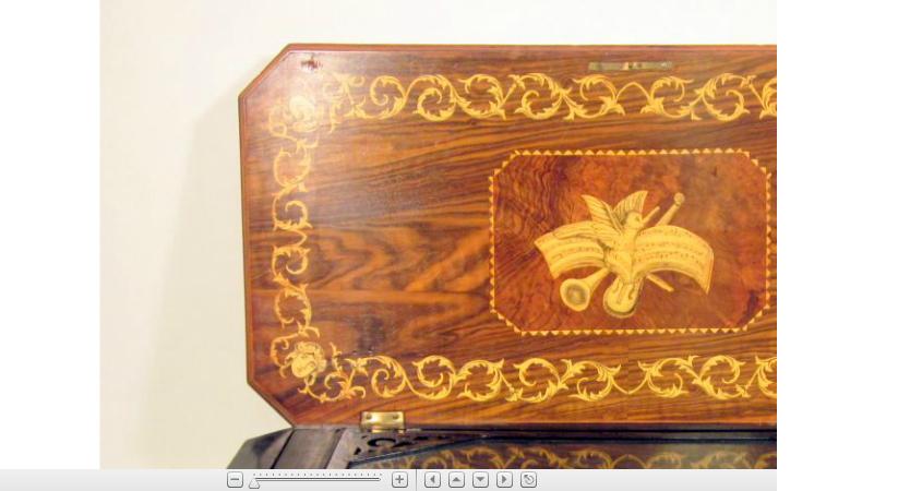 Appraisal: Swiss walnut and marquetry inlaid music boxlate th century with