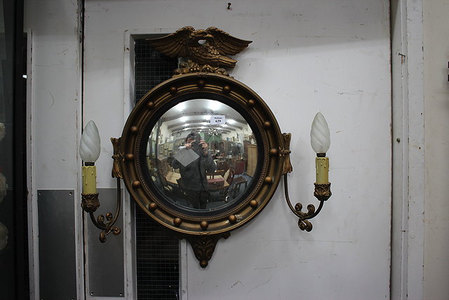 Appraisal: A REGENCY STYLE GILT FRAMED CIRCULAR CONVEX GIRANDOLE MIRROR with