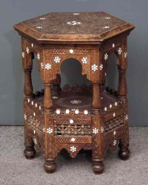 Appraisal: A near Eastern stained wood hexagonal two tier occasional table