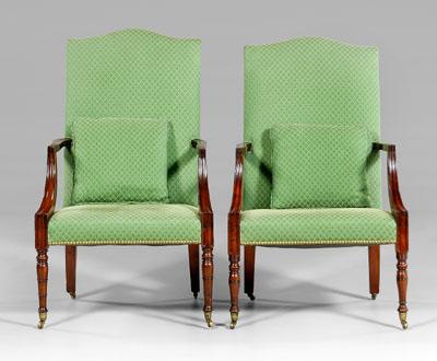 Appraisal: Assembled pair fine Federal lolling chairs each with arched crest