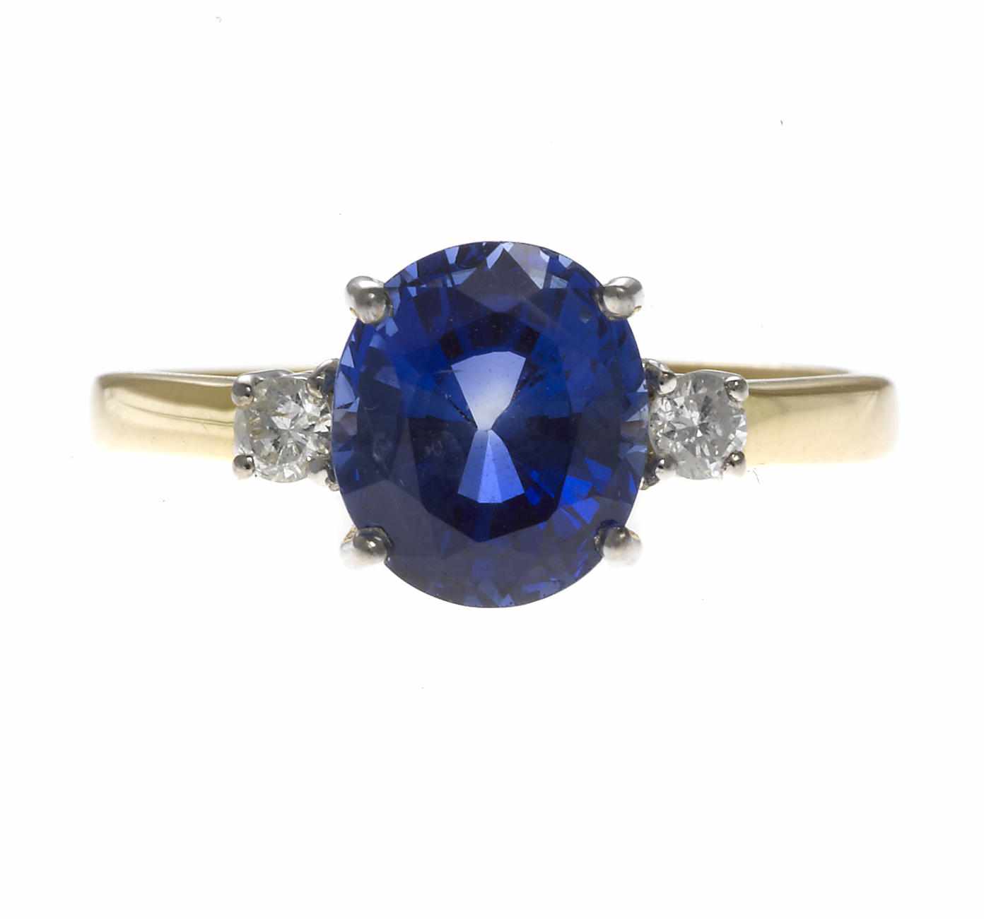 Appraisal: A sapphire and diamond ring oval-shaped sapphire weighing approximately carats