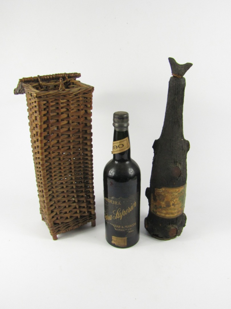 Appraisal: A bottle of Agwar Marcos Madeira Superior in a wicker