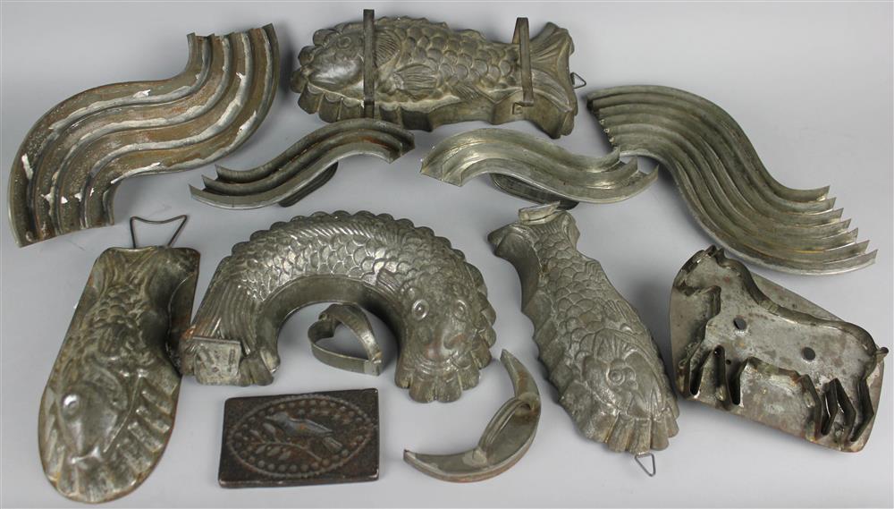 Appraisal: TWELVE COOKIE CUTTERS AND BAKING MOLDS including a horse moon