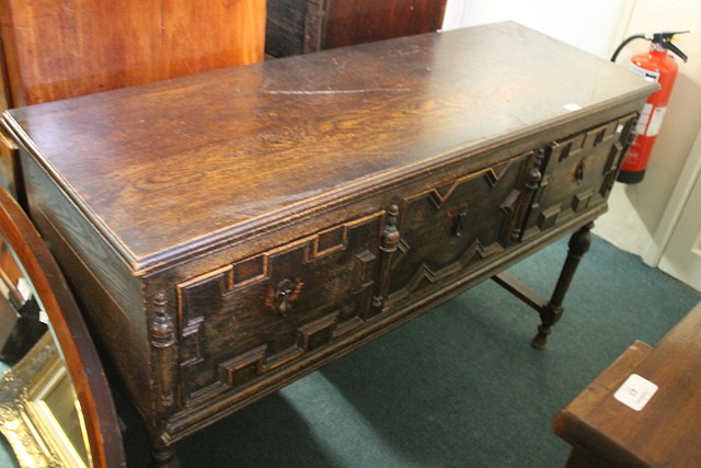 Appraisal: A OAK CAROLEAN STYLE DRESSER BASE fitted three drawers cm