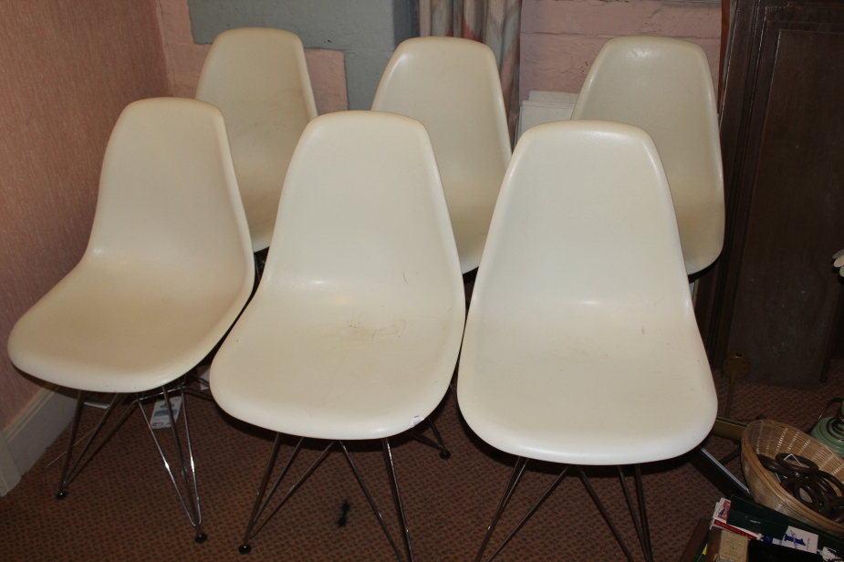 Appraisal: A set of six s style white plastic chairs