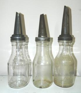 Appraisal: Oil Oil- clear metal funnel tops quart embossed 'Mass O-