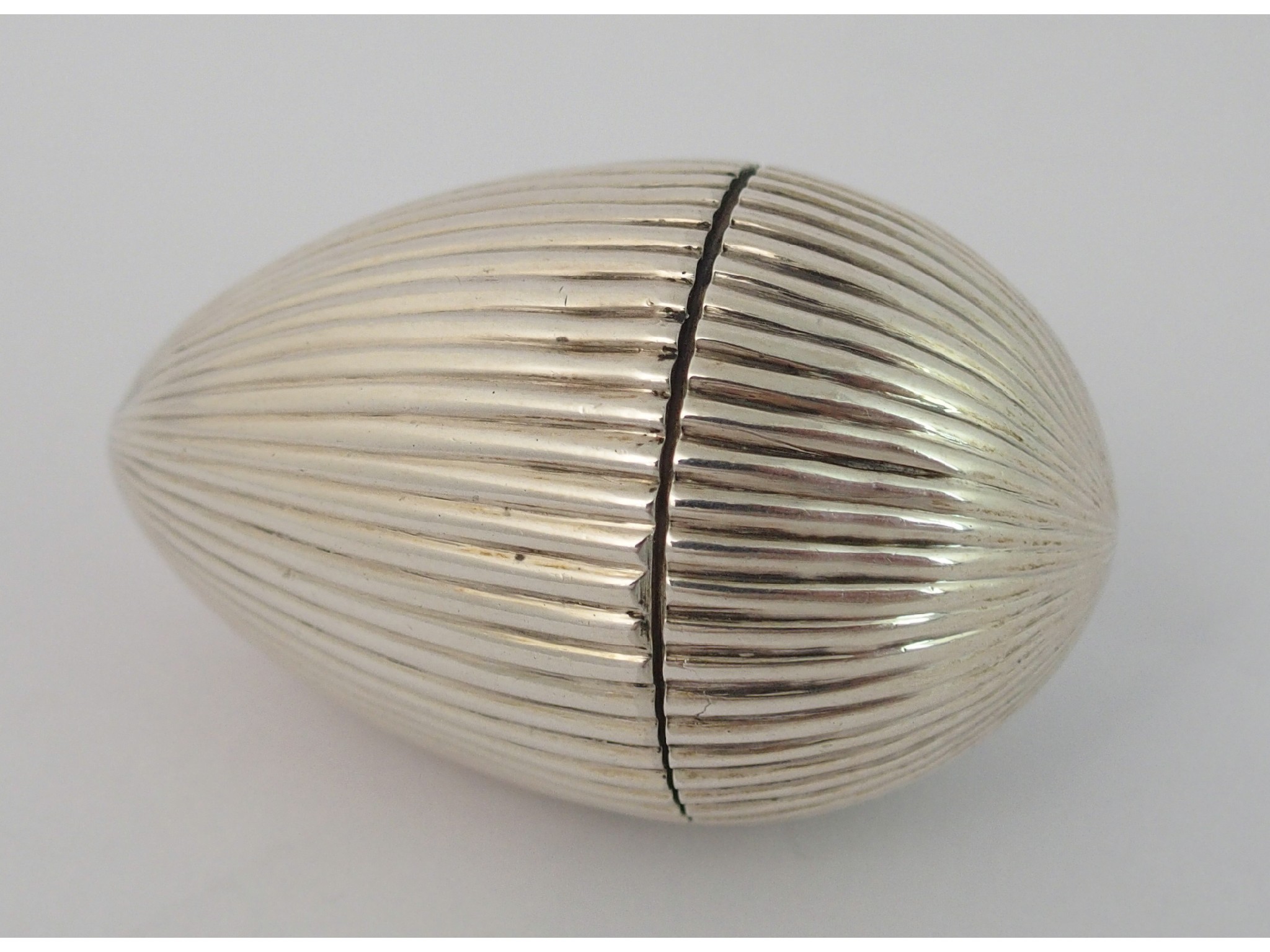 Appraisal: A silver nutmeg graterrubbed maker's marks possibly Birmingham egg shaped