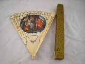 Appraisal: A pierced ivory fan with central vignette in case