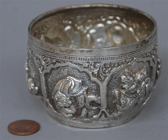 Appraisal: A CHINESE SILVER BOWL Chased with animal and dragon designs