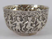 Appraisal: An Eastern white metal tests silver bowl embossed with clothed