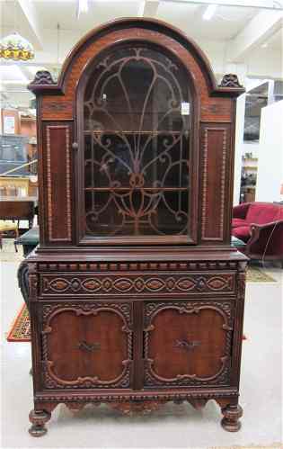 Appraisal: WALNUT CHINA DISPLAY CABINET ON CABINET American c 's the