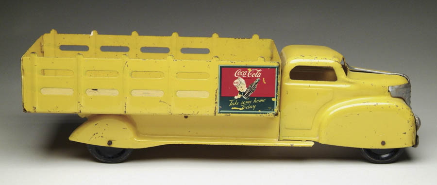 Appraisal: MARX MAKER YELLOW STAKE TRUCK Cab and stake body is