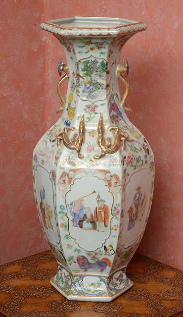 Appraisal: A CHINESE CELADON GROUND HEXAGONAL VASE with applied dragon decoration