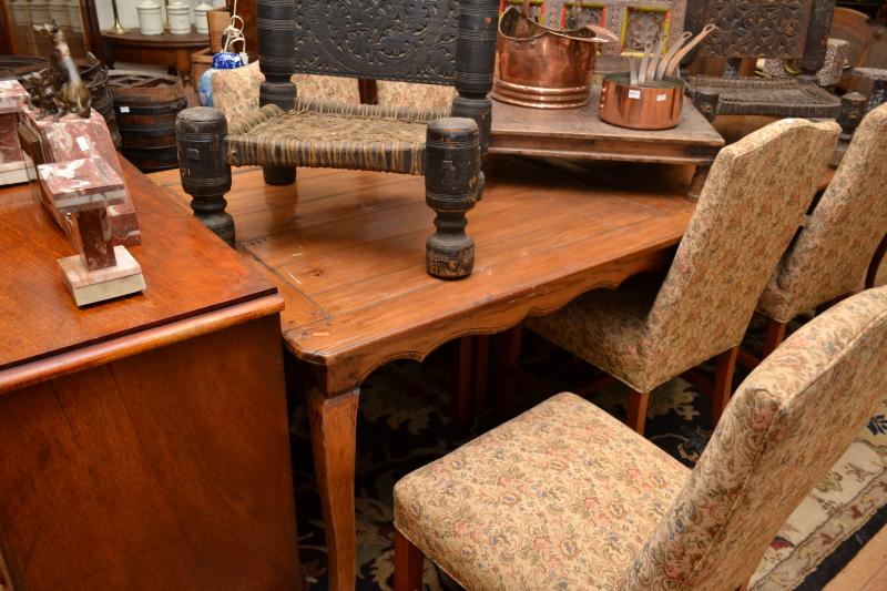 Appraisal: A PROVINCIAL STYLE FARMHOUSE DINING TABLE A PROVINCIAL STYLE FARMHOUSE