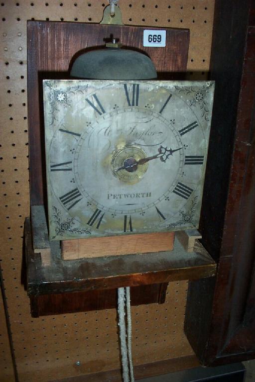 Appraisal: A small th century wall clock with verge escapement and