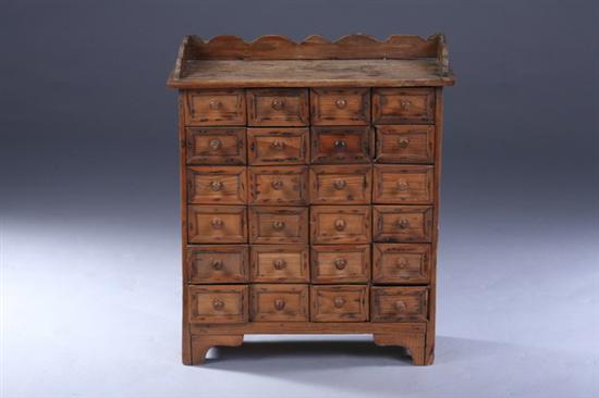 Appraisal: TWENTY-FOUR DRAWER SPICE CABINET th century Three-quarter serpentine gallery top