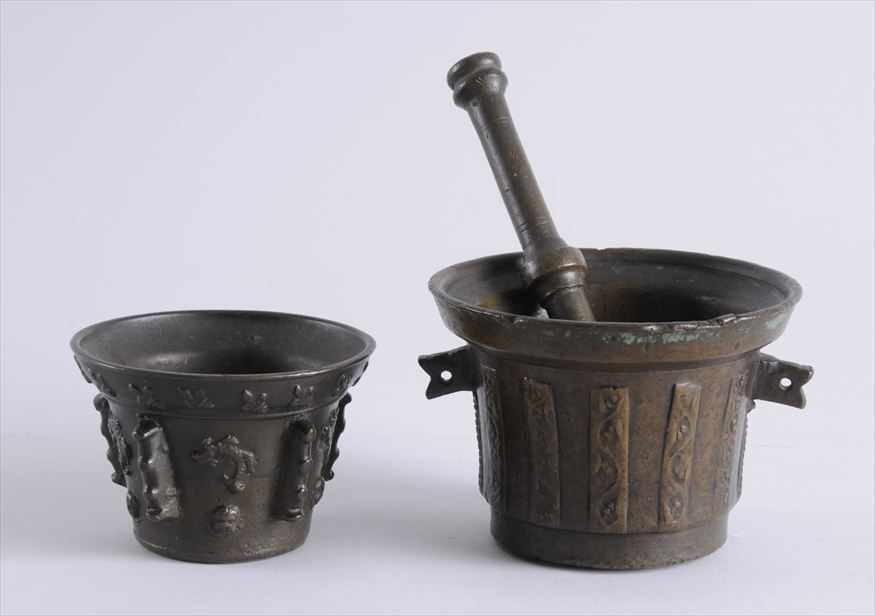 Appraisal: TWO ITALIAN BAROQUE BRONZE MORTARS AND ONE PESTLE The larger