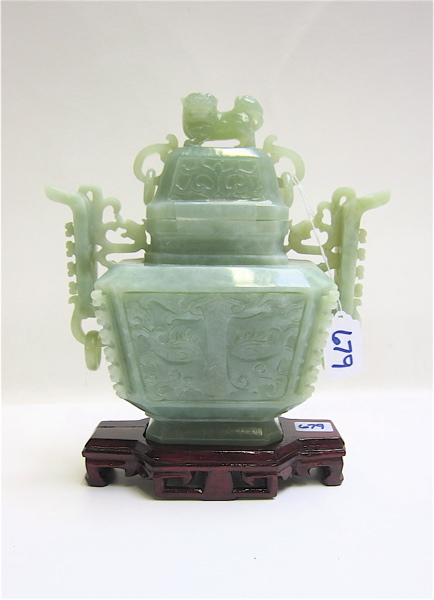 Appraisal: CHINESE CARVED GREEN JADE CENSER having foo dog finial flanking