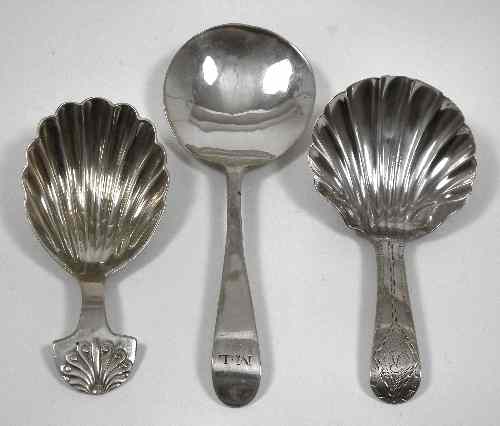 Appraisal: A George III silver caddy spoon with shell pattern bowl